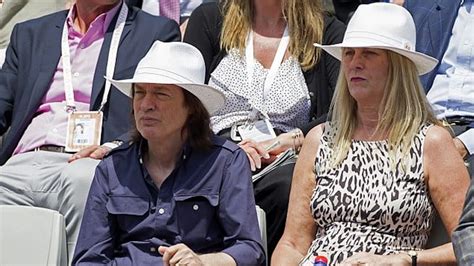 angus young and wife|Ellen Young is married to AC/DC guitarist, Angus .